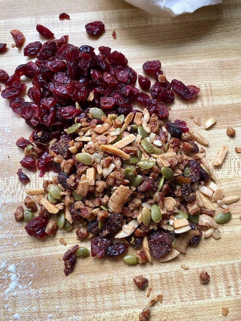 this is a photo of dried cranberries and nuts to be kneaded into bread