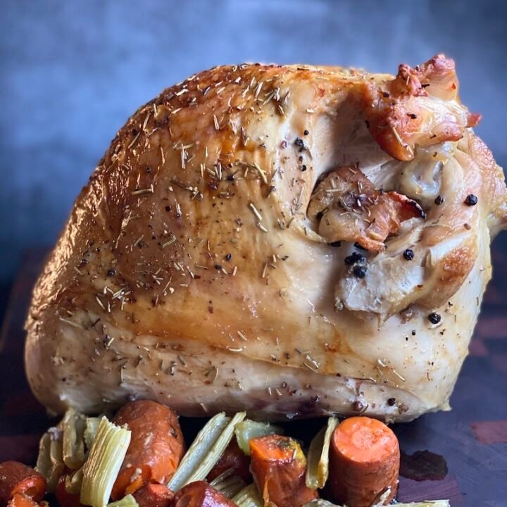 this is a photo of oven roasted turkey with root vegetables