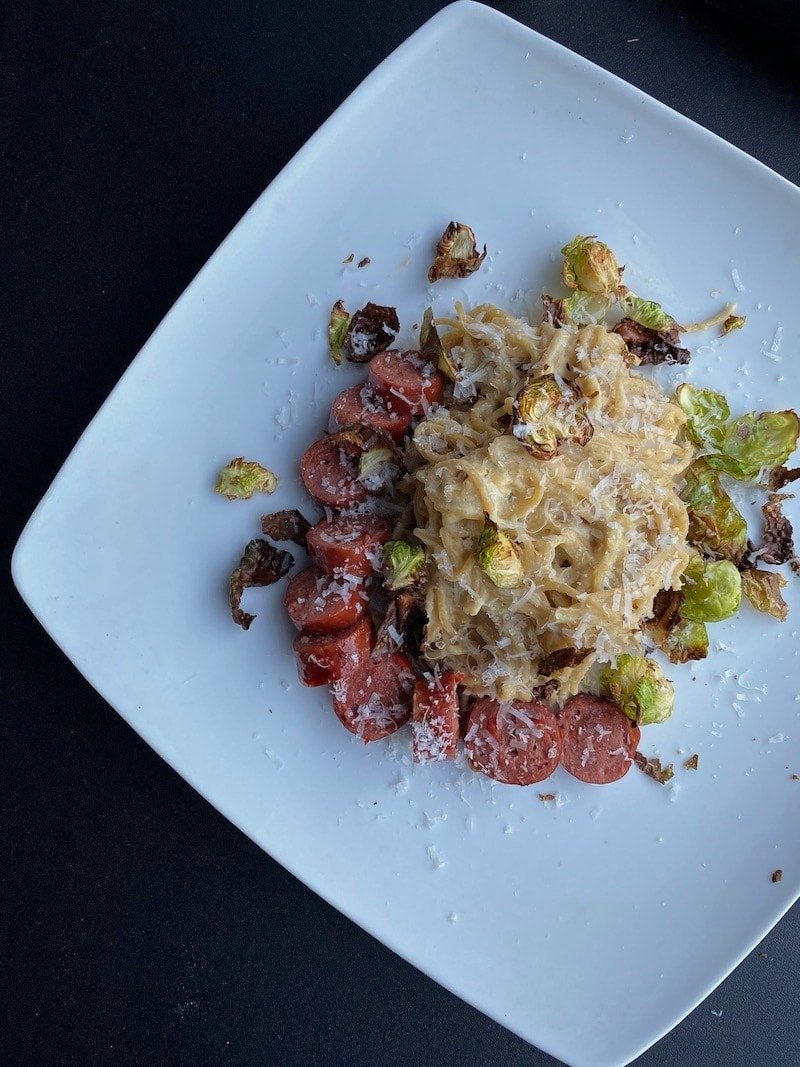 this is delicata squash pasta with sausage and brussel sprouts