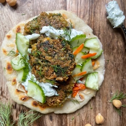 this is a photo of a falafel sandwich on naan bread