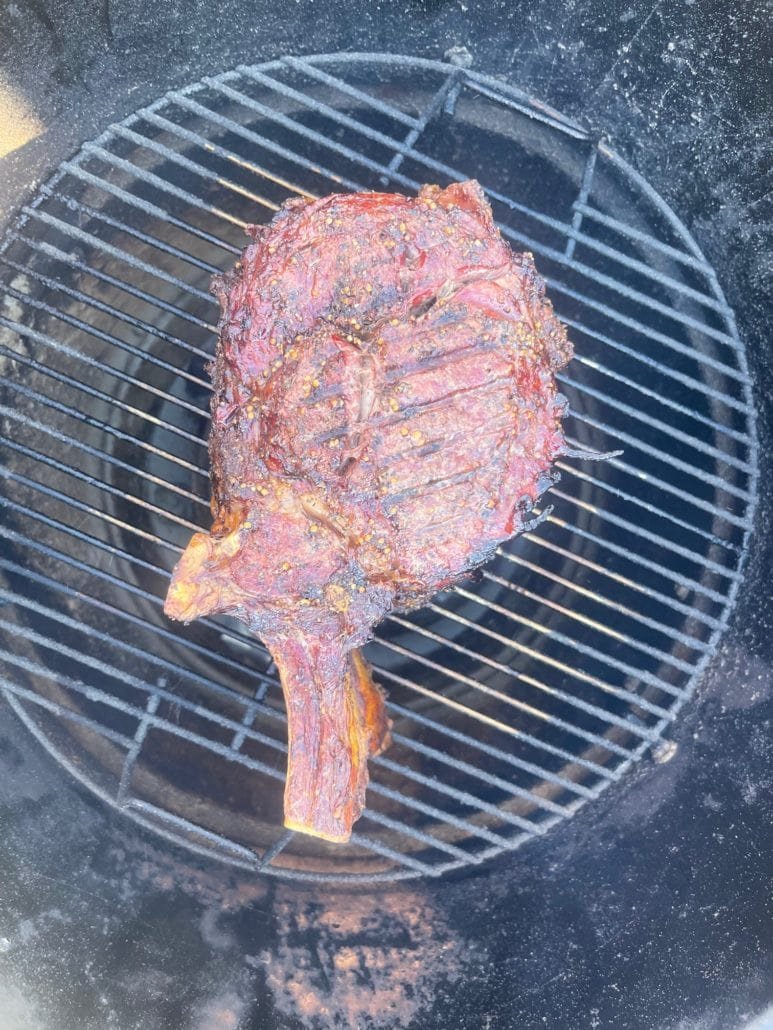 This is a beef rib roast on a grill.