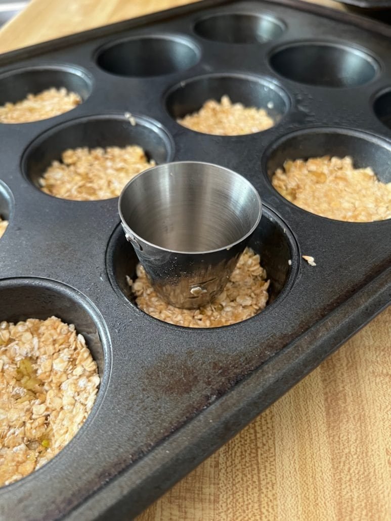 this is pressing down the cookie mixture for key lime bites