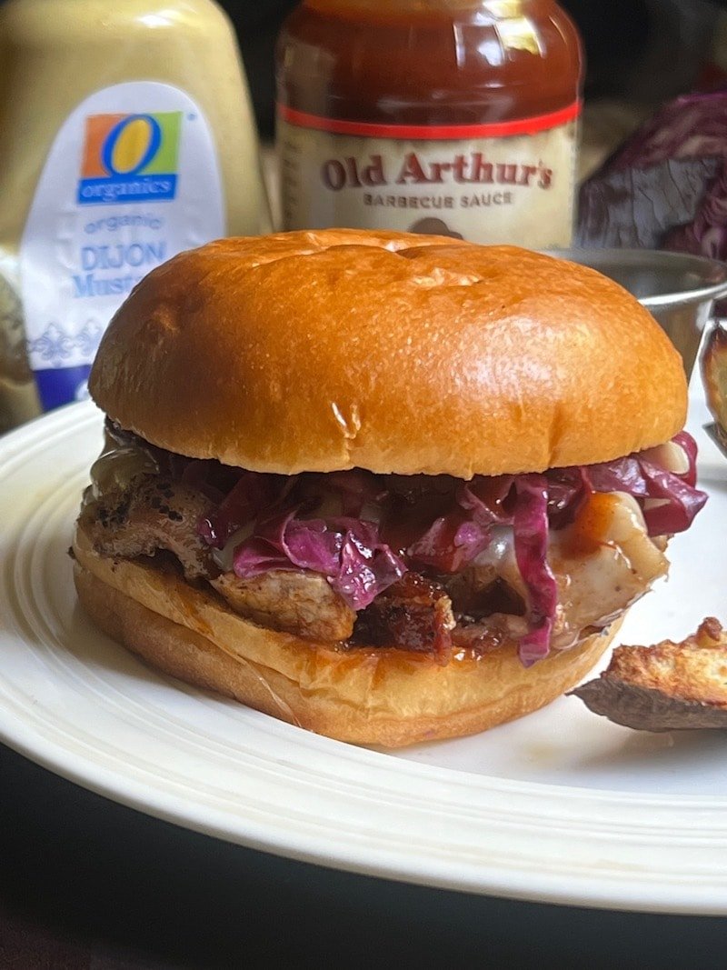 homemade pork bbq sandwich with homemade sauerkraut