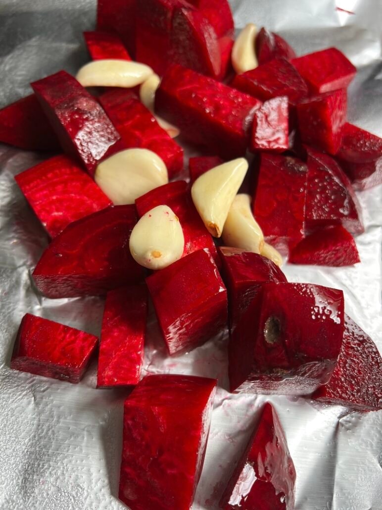 this is beets and garlic ready for roasting for hummus