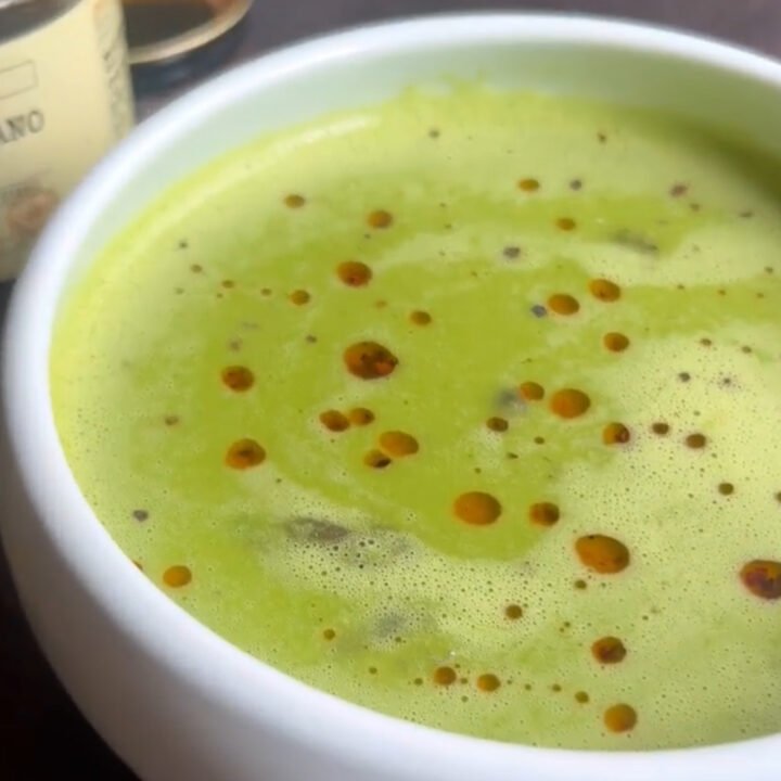 This is a bowl of asparagus soup with chili oil