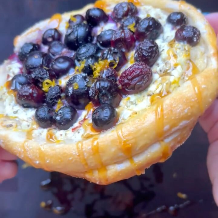 This is a photo of a blueberry tart made with cottage cheese and hot honey