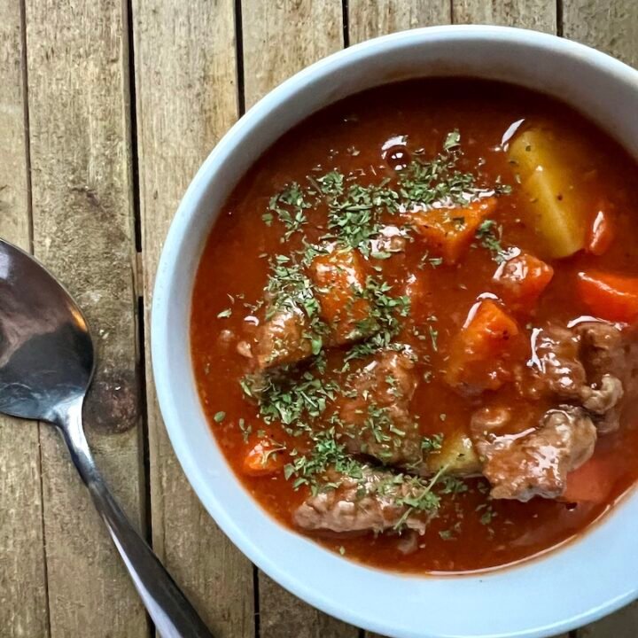 this is a bowl of golden mushroom beef stew