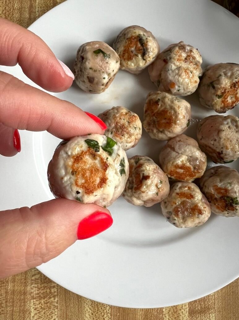 this is a plate of seared turkey meatballs