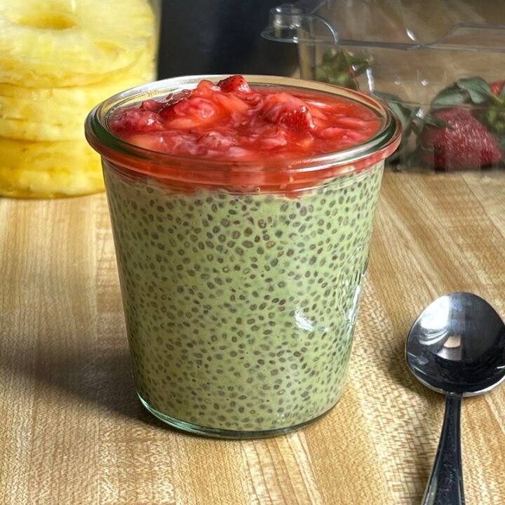 this is matcha chia pudding with strawberries and pineapple on top