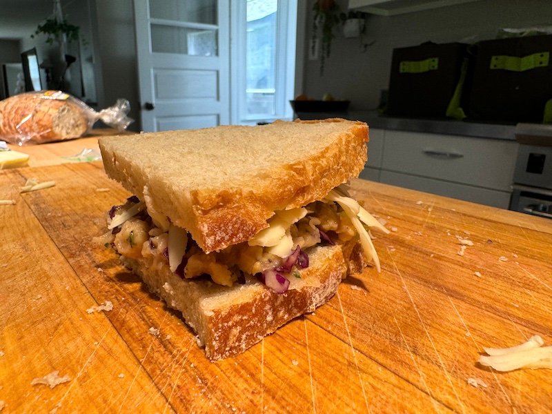 this is a chickpea salad grilled cheese ready for the skillet