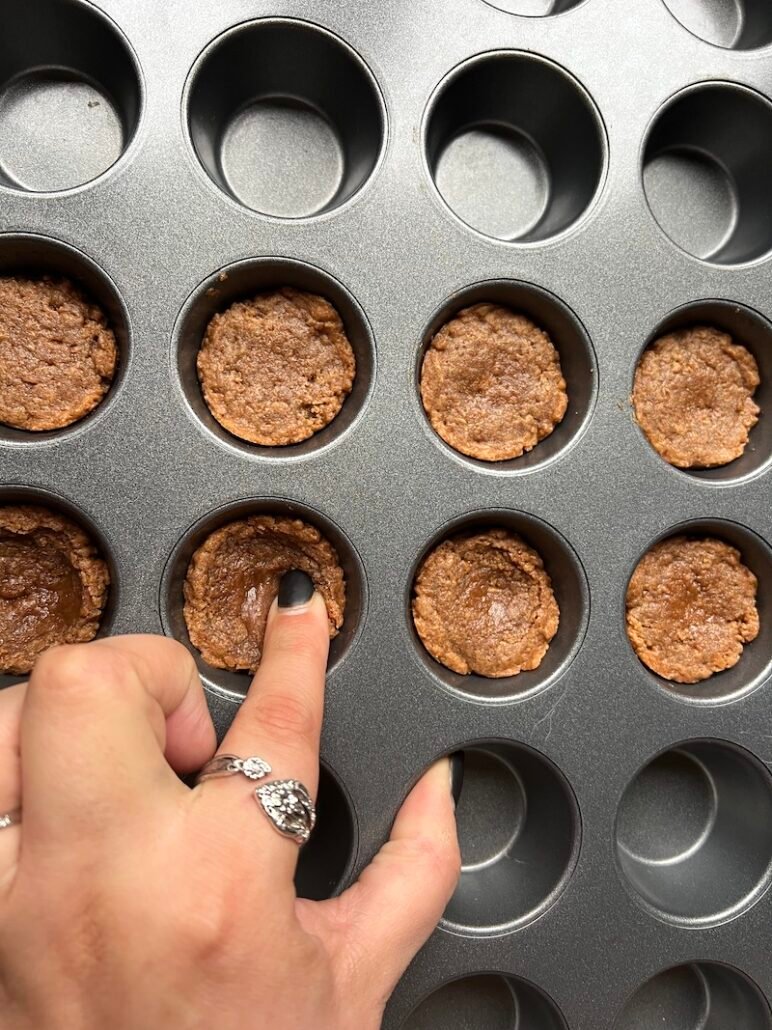 after the graham cracker crust parbakes, while still warm, press down with finger to make a well - these are Weight Watchers friendly too!